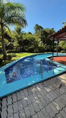a swimming pool in a resort with a blue at Villa Fortuna in San José Pinilla