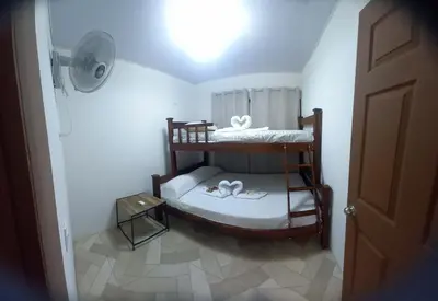 a small bedroom with a bunk bed in a room at Villa Fortuna in San José Pinilla
