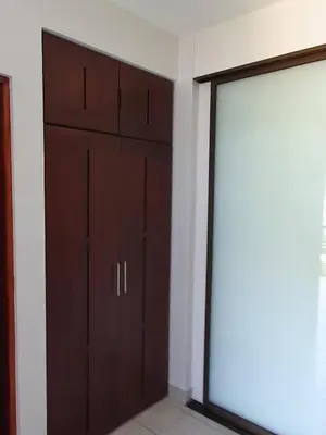 a room with a closet and a door at Marina Loft Condos 212 in Coco