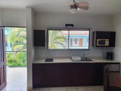 a kitchen with a sink and a window at Marina Loft Studio 224 in Coco