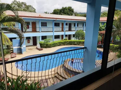 a view from a balcony of a hotel with a swimming pool at Marina Loft Studio 224 in Coco