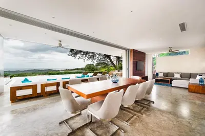a dining room with a table and chairs at Costa Rica Luxury Ocean View in Playa Ostional