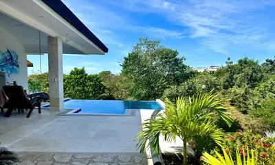 a view of a swimming pool from a house at Villas with breathtaking seaview in Marbella