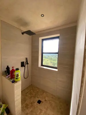 a bathroom with a window on the wall at Private room in nature in Coronado