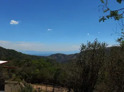 a view of the mountains from a house at Cabina el atardecer in Monteverde Costa Rica