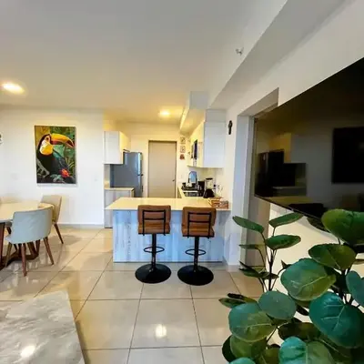Top-floor overlooking uptown with AC & parking