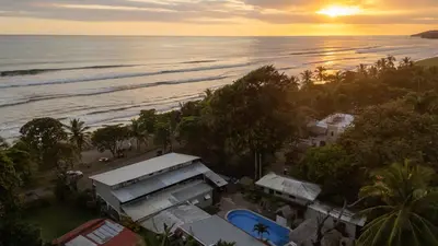 an aerial view of the beach and the ocean at Casa Nova at La Escapadita in Esterillos