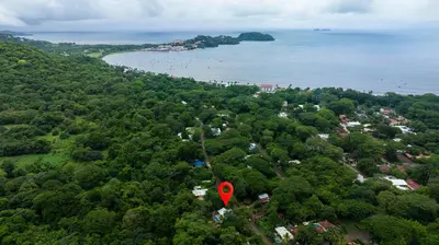 an aerial view of a town with a red marker at Pequeno Paraiso - New Studio, 10min walk to Potrero beach, tranquil - Unit D in Potrero