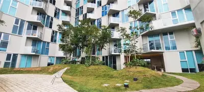 a building with a grassy hill in front of a building at Sabana Chic in Hatillo