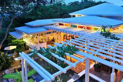 an aerial view of a house with a blue roof at Villa Turrubares in San Pablo
