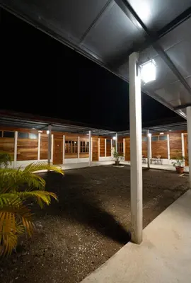 a large building with a light on the ceiling at Bay Lodge in La Cruz