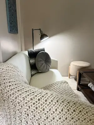 a white couch with a pillow on it in a room at Apartamento Chic en la Montaña AC in Turrialba