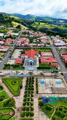 an aerial view of a town with a building at Nido del Parque, Zarcero in Zarcero