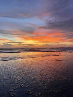a sunset over a body of water at Casa Guanabana in Nicoya