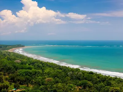 an aerial view of a beach and the ocean at Villa Serenidad in Uvita