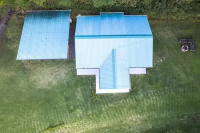an overhead view of a house with a blue roof at Casa Grano de Oro Cozy Home in Monteverde in Turín