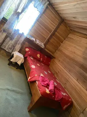 an overhead view of a bed in a room at Casa Vacacional fachento house in Parrita