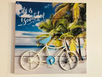 a picture of a bike parked on the beach at La buena vida ocean Tamarindo in Libertad