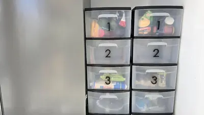 a shelf filled with plastic containers with numbers on them at Mango Coliving Rooms for Digital Nomads in Uvita