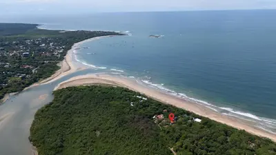 an aerial view of a beach and the ocean at Casa Oasis Beach Villa with Pool, Playa Grande in Santa Cruz