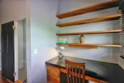 a home office with a desk and a chair at Villas Aracari beautiful upscale homes with amazing views near SJO airport in Pilas