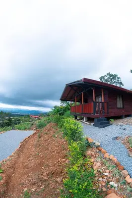 a house on the side of a hill at Cabaña Con Hermosa vista y ambiente de campo in Miravalles
