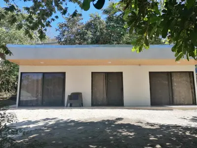 a building with a blue chair in front of it at Apartamento JOKO in Villarreal
