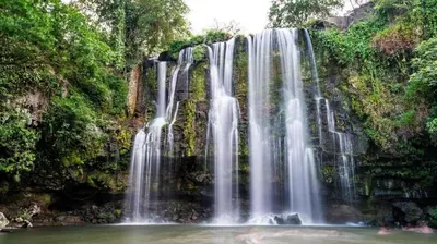 a waterfall in the middle of a river at Quinta Bella in Bagaces