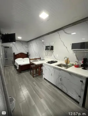 a kitchen with a sink and a counter top at Apartamento doña Lety in Fortuna