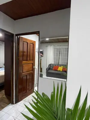 a door leading into a bedroom with a bunk bed at Downtown volcano House in Fortuna