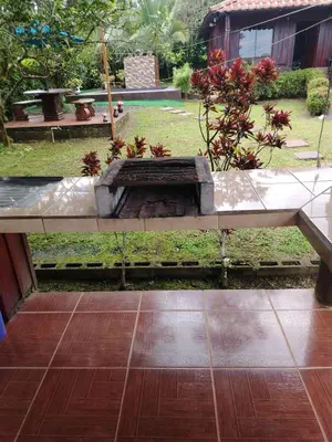 a view of a garden with a fire pit at Villa Guayacanes Forest in Chachagua