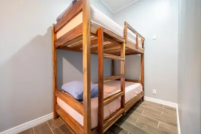 a couple of bunk beds in a room at Monte Donato 18 - Apt 2 in Playa Avellana
