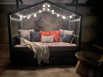 a large couch with lights on top of it at Casa Tres Luces - Samara Home in Nicoya