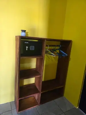 a small cabinet with a tv in a room at Rusticas Dani in Tanque