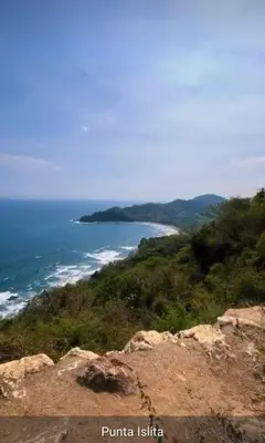 a view of the ocean from the top of a mountain at Cabañas Corozalito in Corozalito