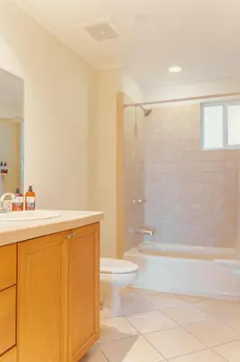 a bathroom with a tub and a toilet and a sink at CR Luxury Del Mar 2Q 3 Bdrm in La Mona
