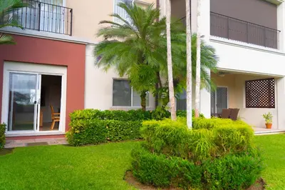 a house with palm trees in a yard at CR Luxury Del Mar 2Q 3 Bdrm in La Mona