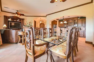 a dining room with a glass table and chairs at CR Luxury Montebello 3F 3 Bdrm in Jacó