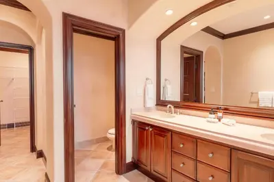 a bathroom with a sink and a toilet and a mirror at CR Luxury Terrazas De Marbella 3A 3 Bdrm in La Mona