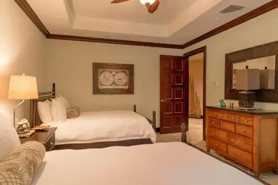 a bedroom with two beds and a dresser and a mirror at CR Luxury Terrazas De Marbella 3A 3 Bdrm in La Mona