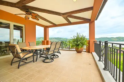 a patio with a table and chairs on a balcony at CR Luxury Terrazas De Marbella 3A 3 Bdrm in La Mona