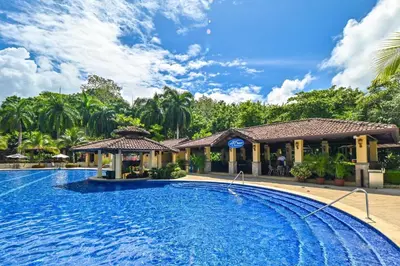 a swimming pool in front of a resort at CR Luxury Terrazas De Marbella 3A 3 Bdrm in La Mona
