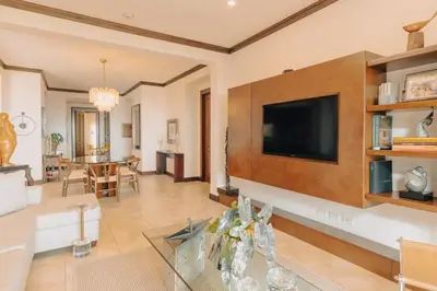a living room with a flat screen tv on a wall at CR Luxury Altavista 2A 3 Bdrm in La Mona