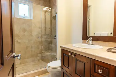 a bathroom with a toilet and a sink and a shower at CR Luxury Altavista 2B 3 Bdrm in La Mona