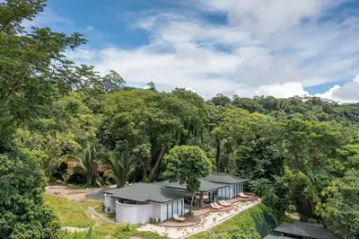 an aerial view of a house in the forest at Villa Ayla - Santa Teresa Minutes from the beach in Carmen