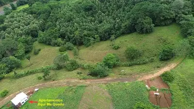 an overhead view of an island with a farm and trees at Apartamentos Aquí Me Quedo in Nandayure