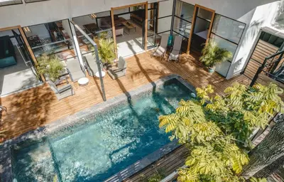 an overhead view of a swimming pool with plants at Villa Primavera Santa Teresa Center- walking distance to the beach in Santa Teresa Beach