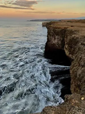 a view of the ocean from a rocky beach at Villa Jr 3, Piscina y Naturaleza, SJO Airport 80min in Tarcoles