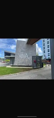 a building with a sign that reads viva jago at 2BR with ocean view in Jacó