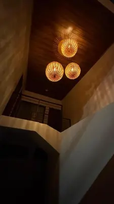 two lights hanging from the ceiling of a building at Cachorro, Puntarenas in Puntarenas